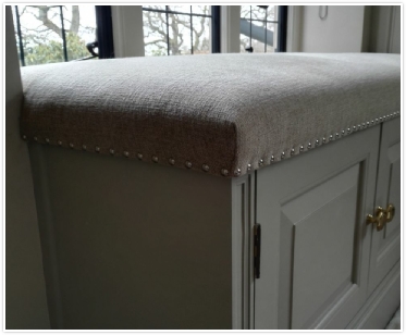 Image of ottoman restored by RH Upholstery